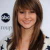 Long layered haircuts with side fringe